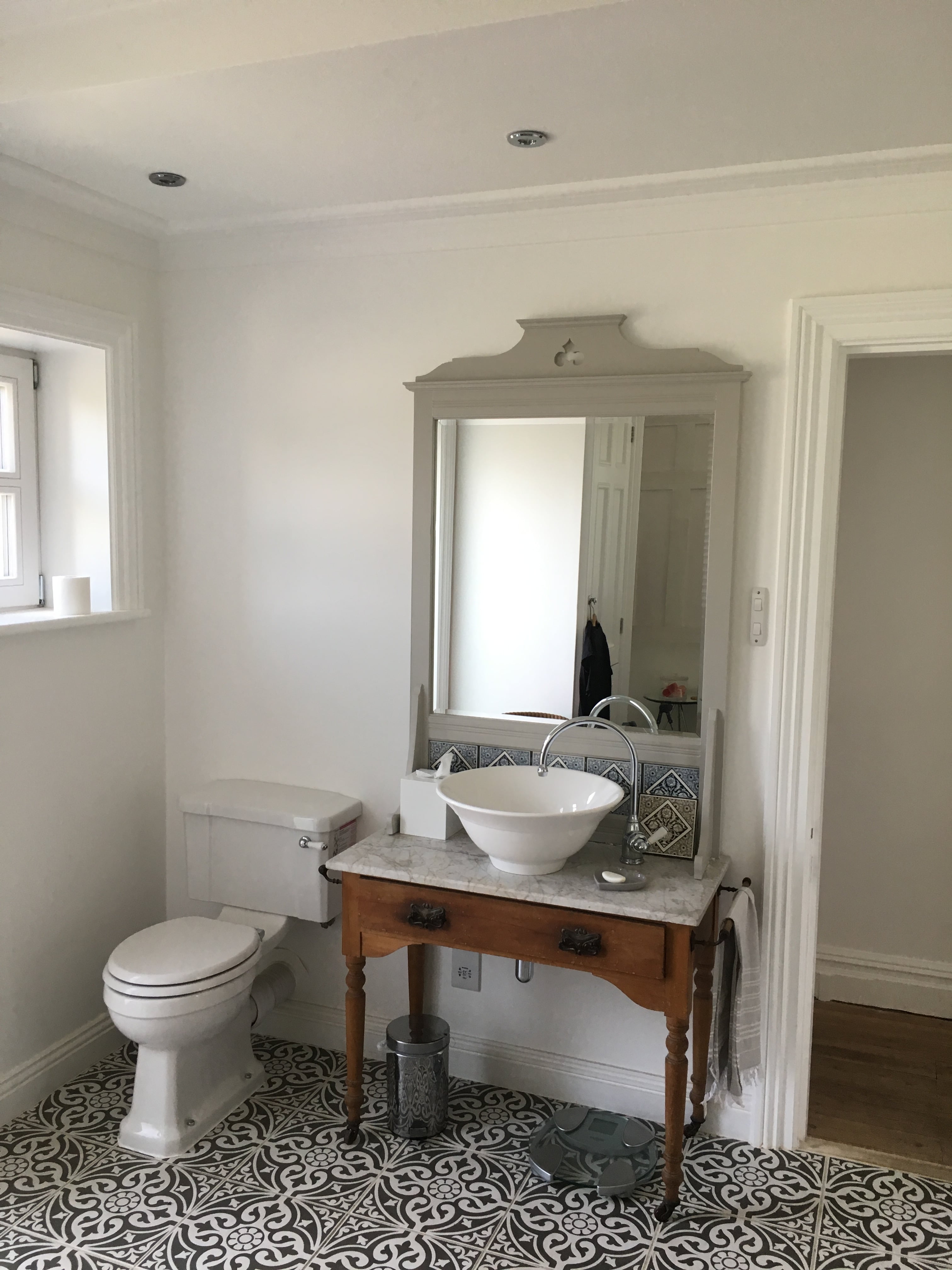 Rebecca bathroom showing wash hand basin min